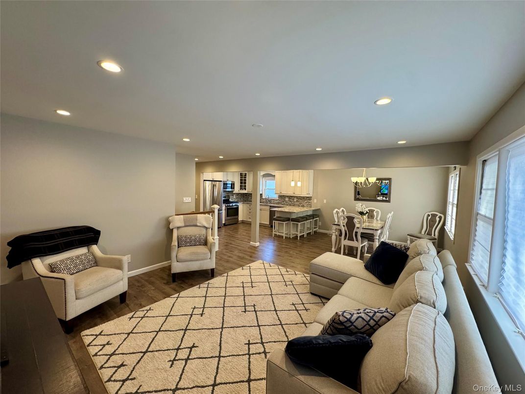 Dining room, Interior, Kitchen, Living room, Recessed Lighting, Stainless Steel Appliances, Wood Texture Flooring