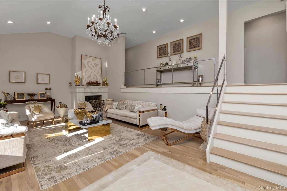 Chandelier, Fireplace, Interior, Living room, Recessed Lighting, Wood Texture Flooring