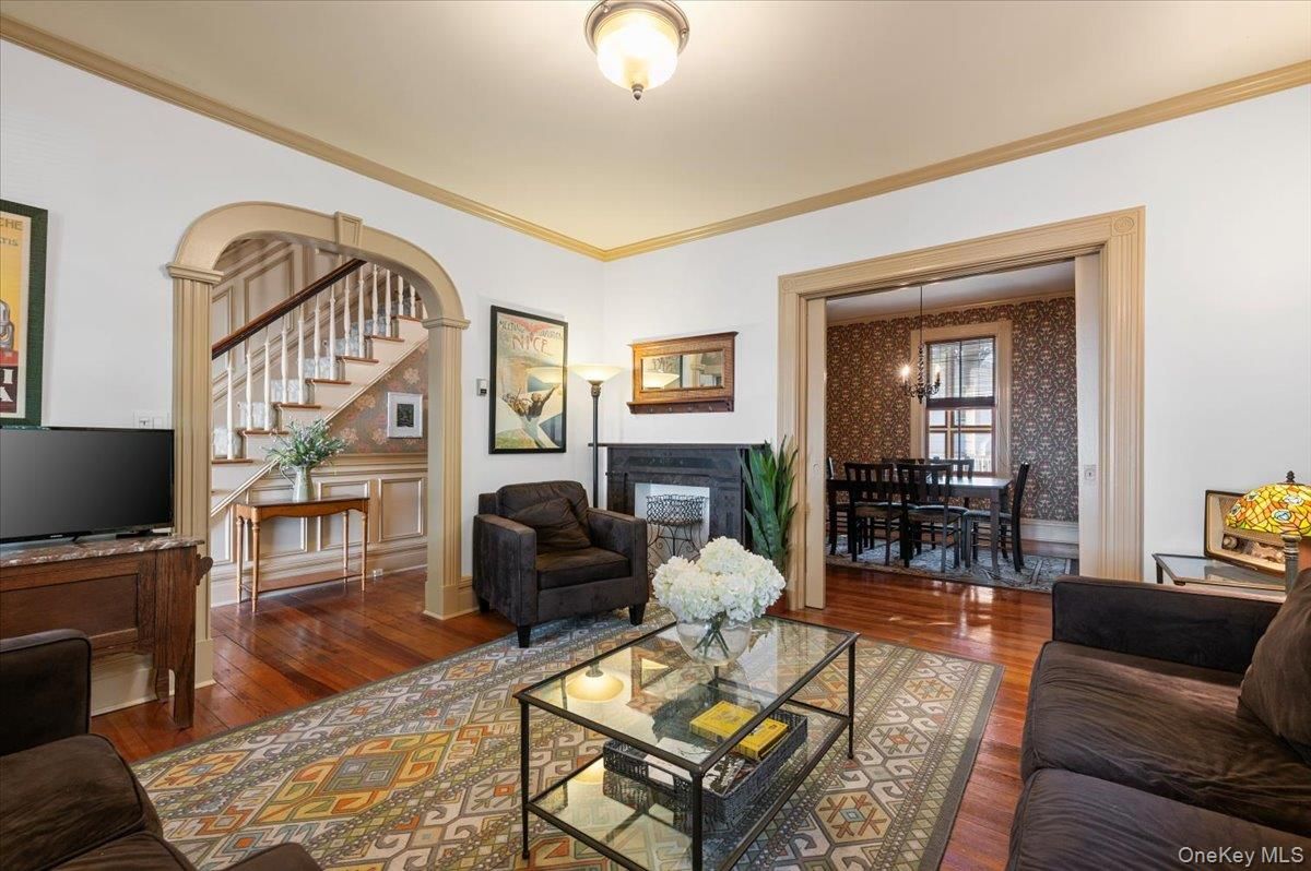 Chandelier, Dining room, Fireplace, Interior, Living room, Pendant Lights, Wood Texture Flooring