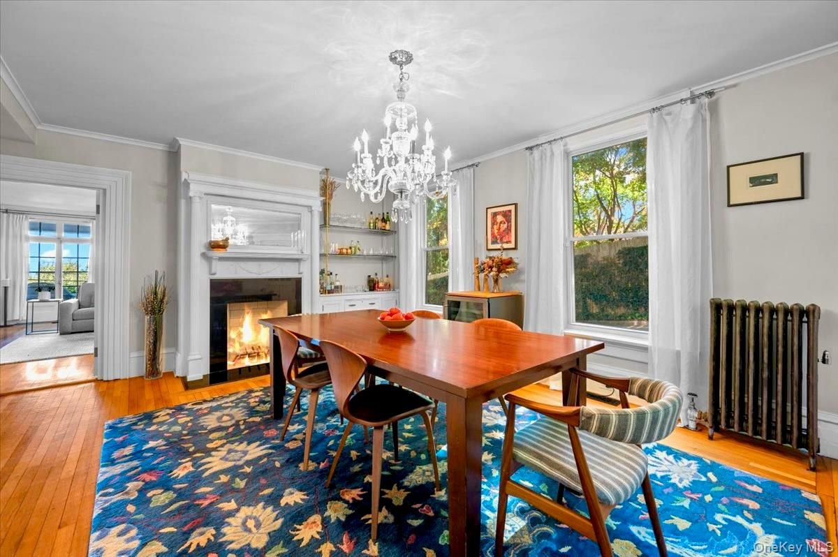 Chandelier, Dining room, Fireplace, Interior, Wood Texture Flooring