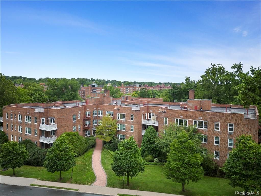 Exterior, Facade, Brick Facade, Condo Building