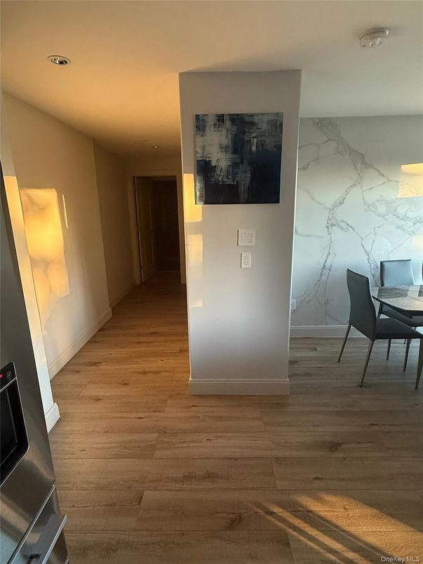 Interior, Marble Walls, Recessed Lighting, Wood Texture Flooring