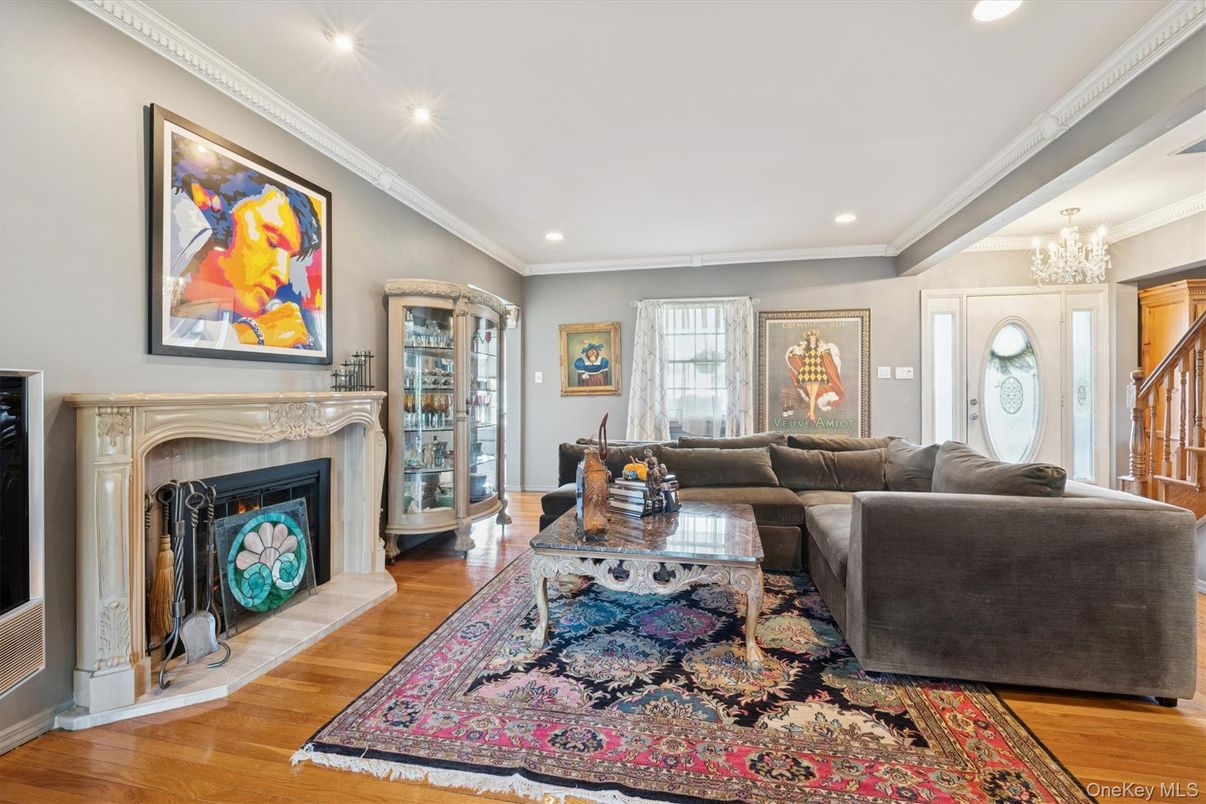 Chandelier, Fireplace, Interior, Living room, Recessed Lighting, Wood Texture Flooring