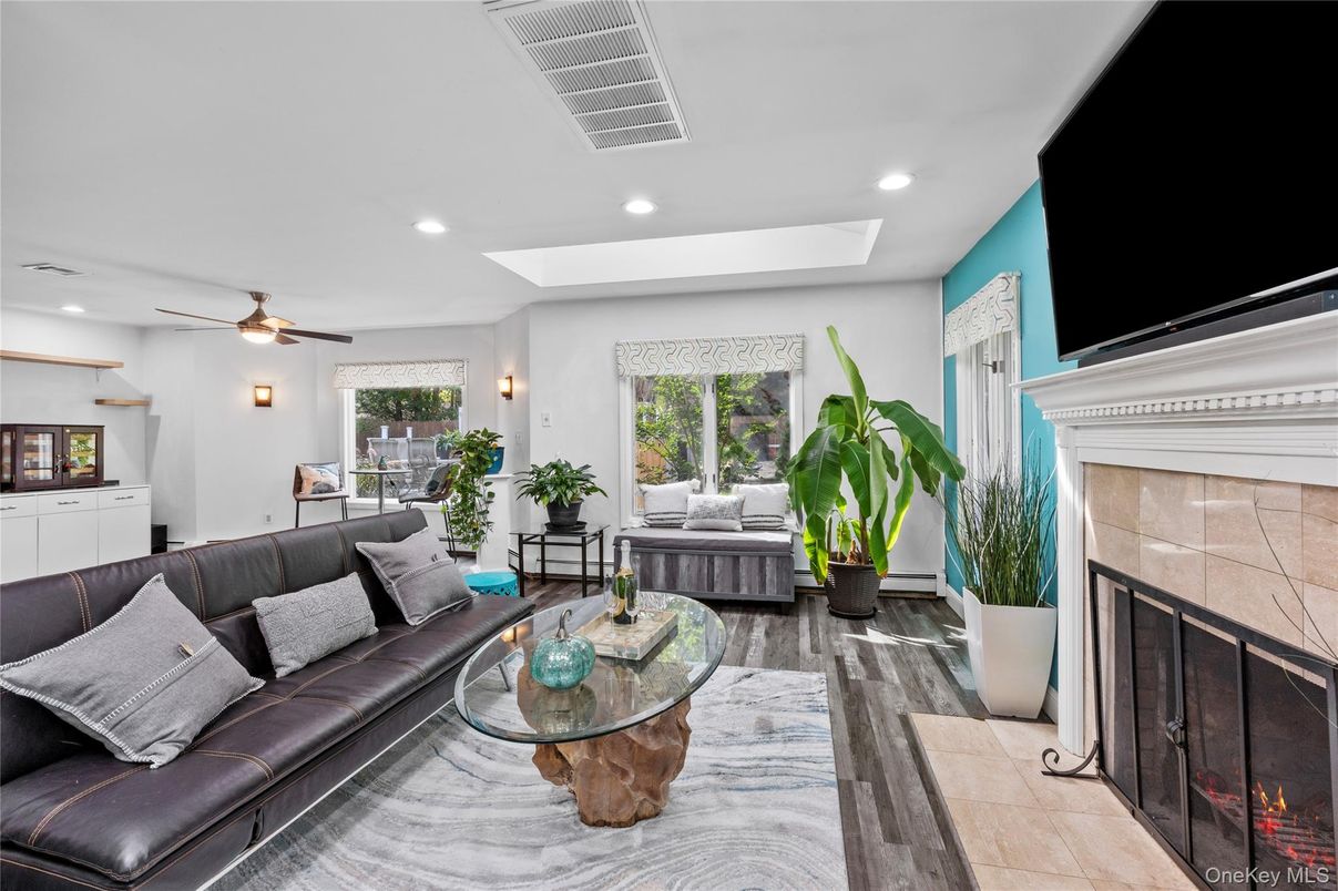 Fireplace, Interior, Living room, Recessed Lighting, Wood Texture Flooring