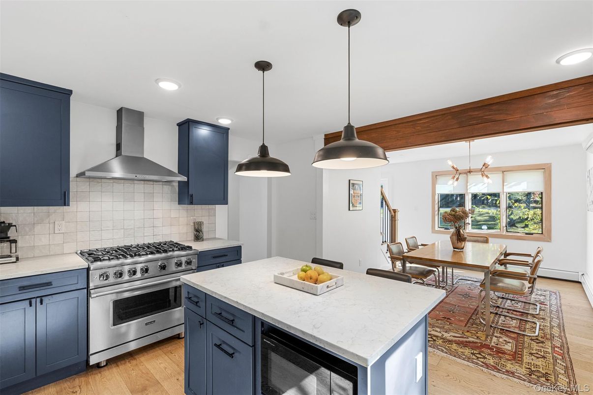 Dining room, Interior, Kitchen, Pendant Lights, Recessed Lighting, Stainless Steel Appliances, Wood Texture Flooring