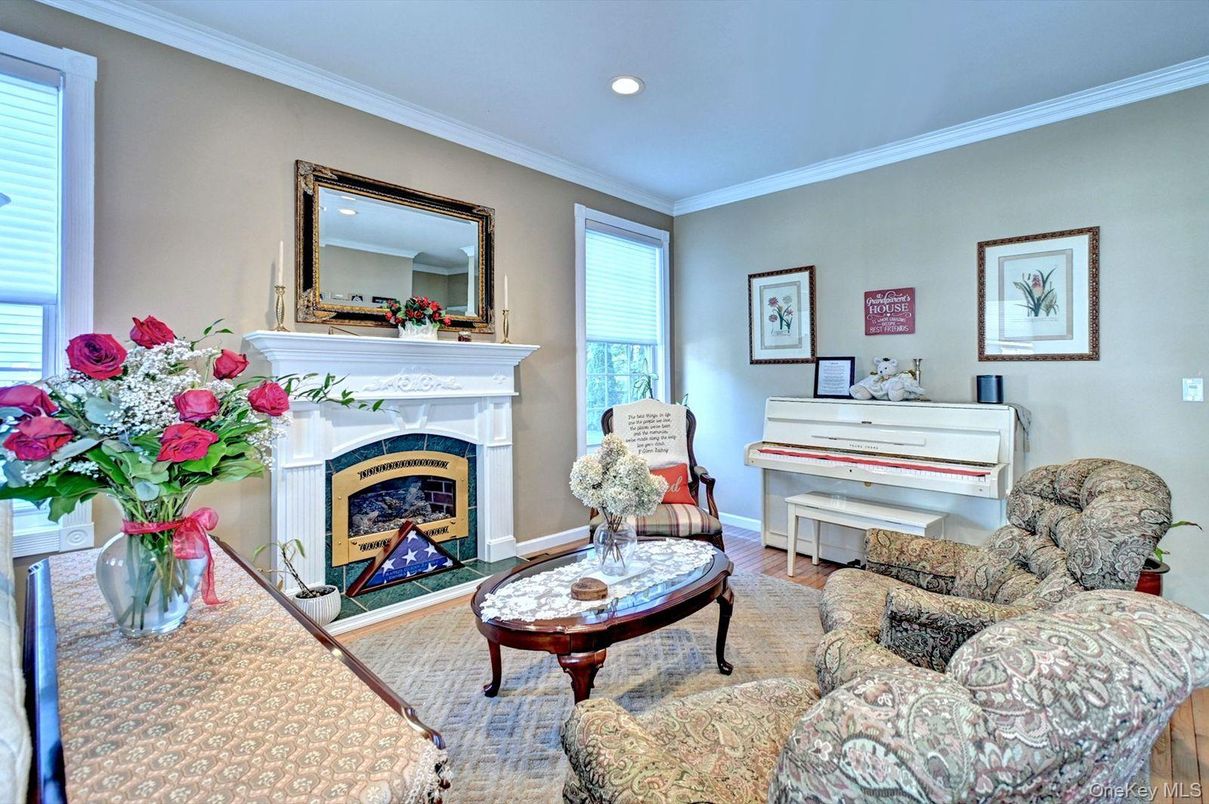 Fireplace, Interior, Living room, Piano, Recessed Lighting, Wood Texture Flooring