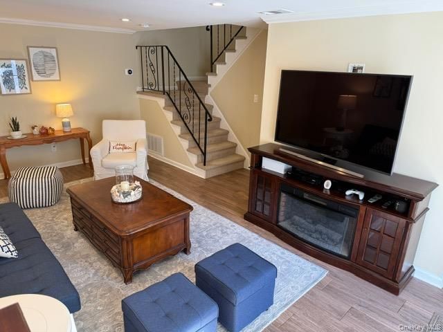 Fireplace, Interior, Living room, Recessed Lighting, Wood Texture Flooring