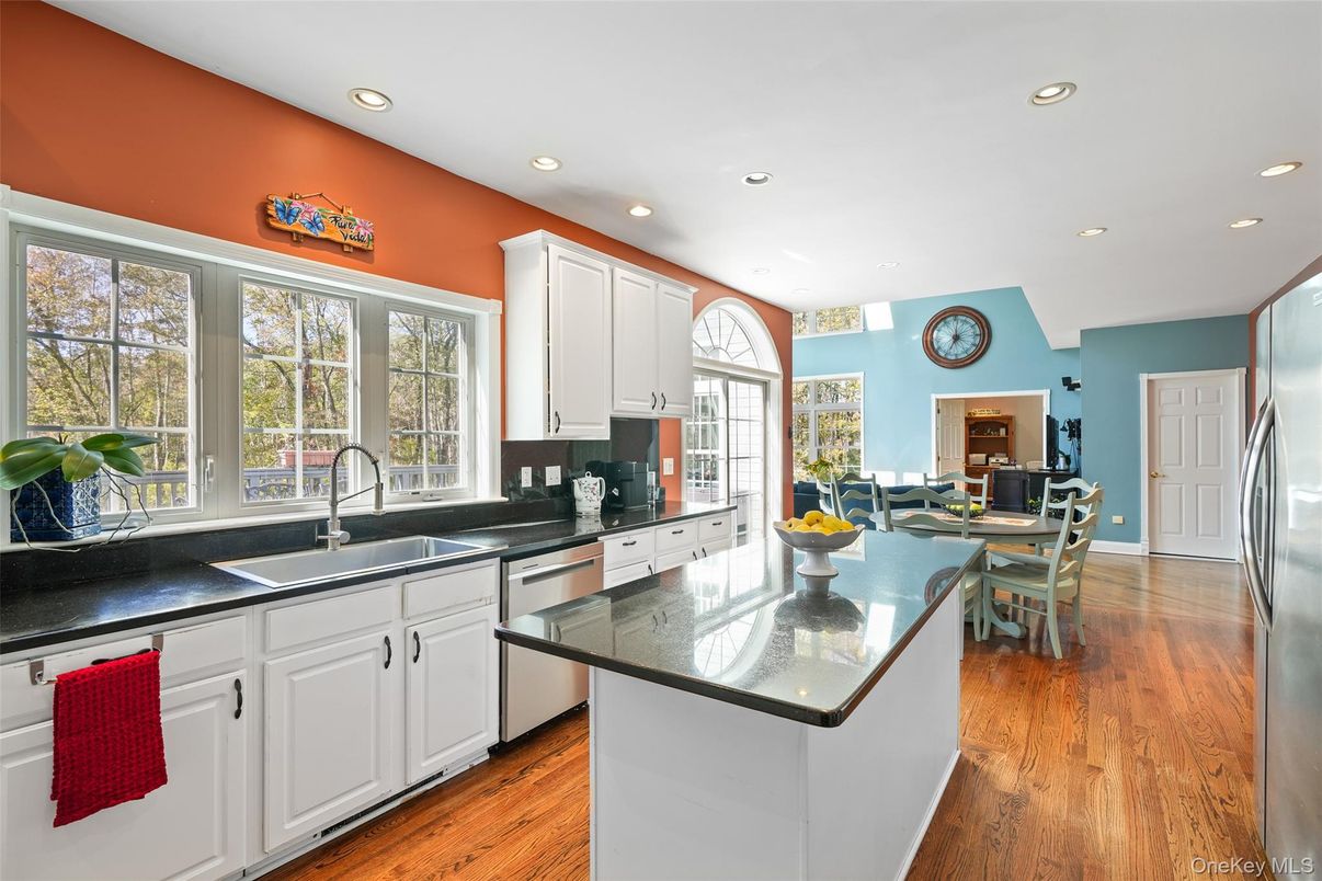 Dining room, Interior, Kitchen, Recessed Lighting, Stainless Steel Appliances, Wood Texture Flooring