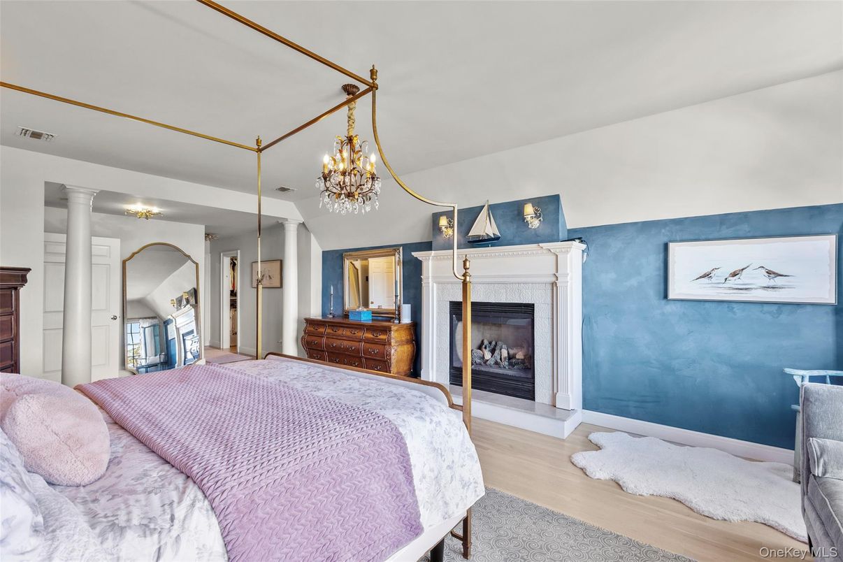Bedroom, Chandelier, Fireplace, Interior, Wood Texture Flooring