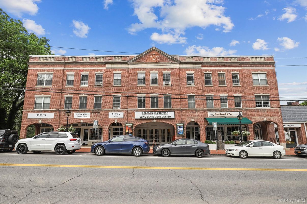 Exterior, Facade, Brick Facade, Condo Building