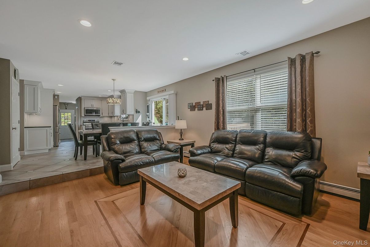 Dining room, Interior, Kitchen, Living room, Pendant Lights, Recessed Lighting, Stainless Steel Appliances, Wood Texture Flooring