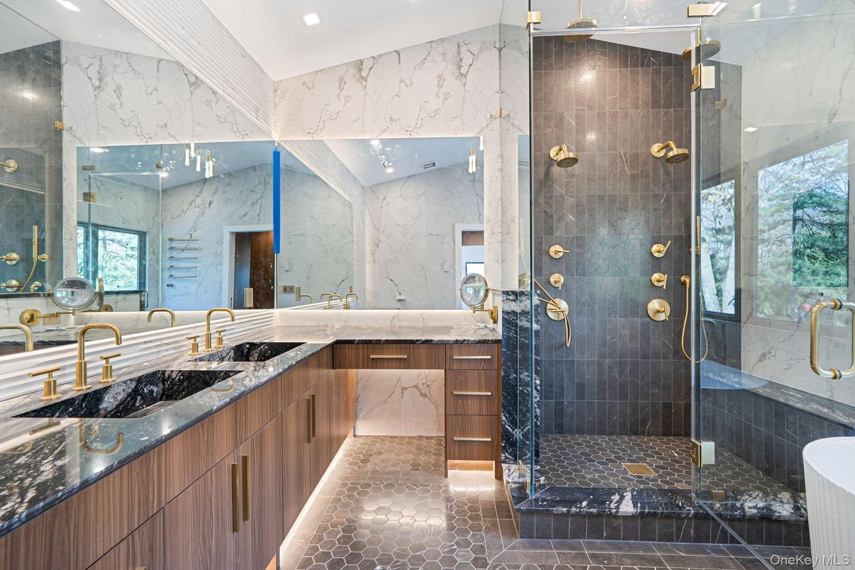 Bathroom, Dual Sink Vanities, Glass Shower, Interior, Marble Walls, Recessed Lighting