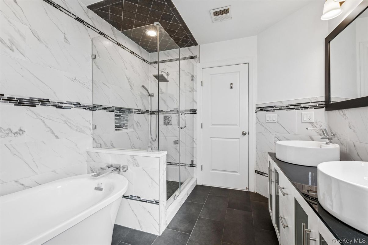 Bathroom, Dual Sink Vanities, Free Standing Baths, Glass Shower, Interior, Marble Walls