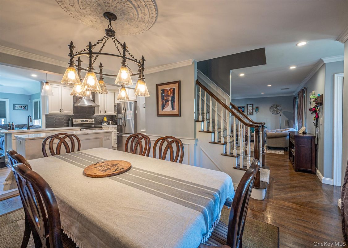 Dining room, Interior, Kitchen, Pendant Lights, Recessed Lighting, Stainless Steel Appliances, Wood Texture Flooring