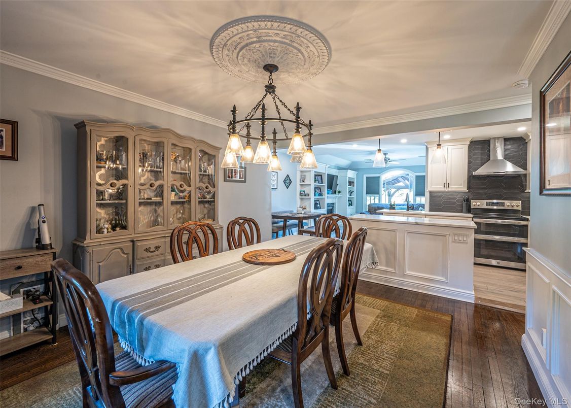 Dining room, Interior, Kitchen, Pendant Lights, Stainless Steel Appliances, Wood Texture Flooring