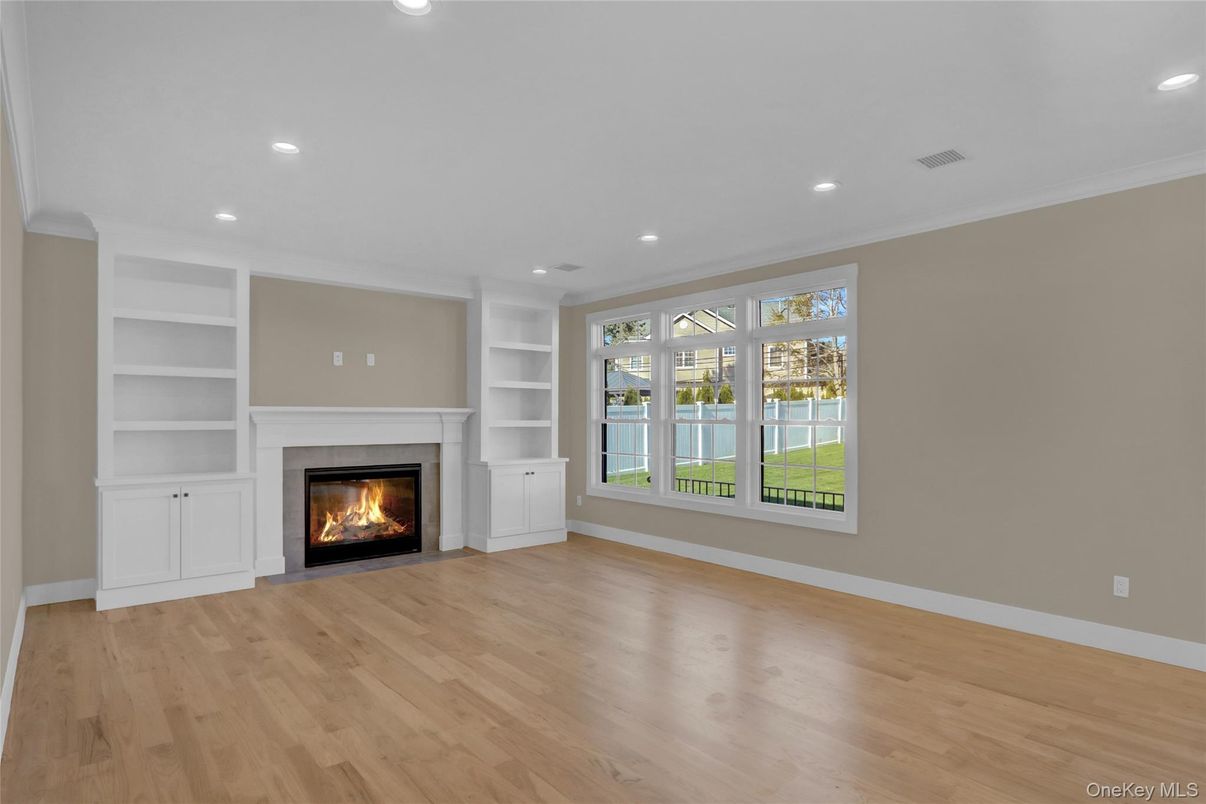 Empty room, Fireplace, Interior, Recessed Lighting, Wood Texture Flooring