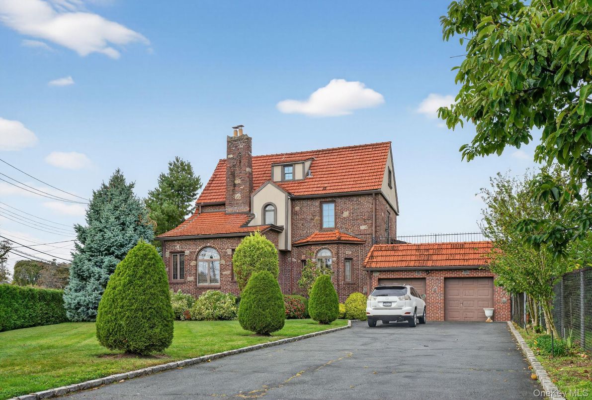Attached, Exterior, Facade, Brick Facade, Tudor Revival