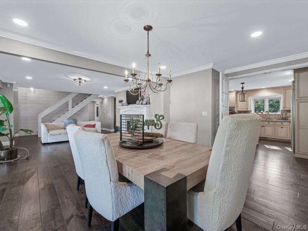 Chandelier, Dining room, Fireplace, Interior, Living room, Recessed Lighting, Wood Texture Flooring