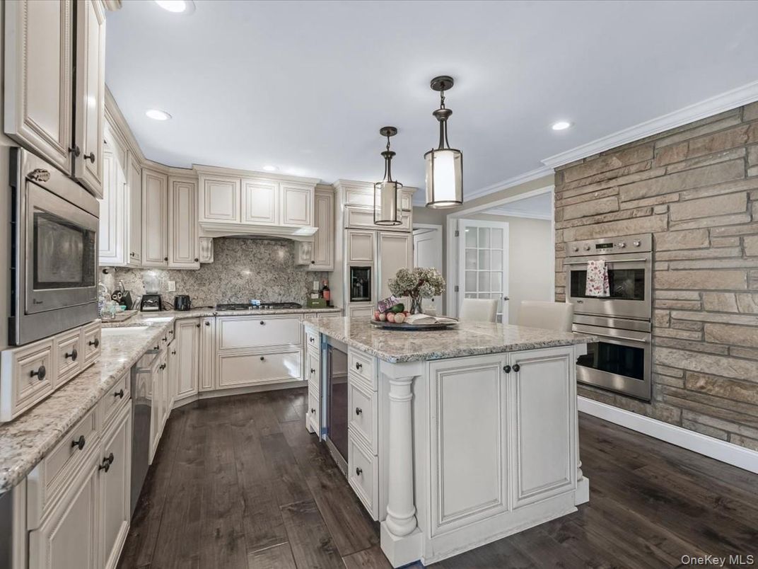 Interior, Kitchen, Pendant Lights, Recessed Lighting, Stainless Steel Appliances, Stone Walls, Wood Texture Flooring