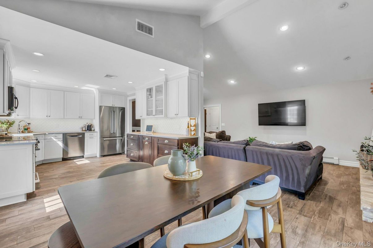 Dining room, Interior, Kitchen, Living room, Recessed Lighting, Stainless Steel Appliances, Wood Texture Flooring
