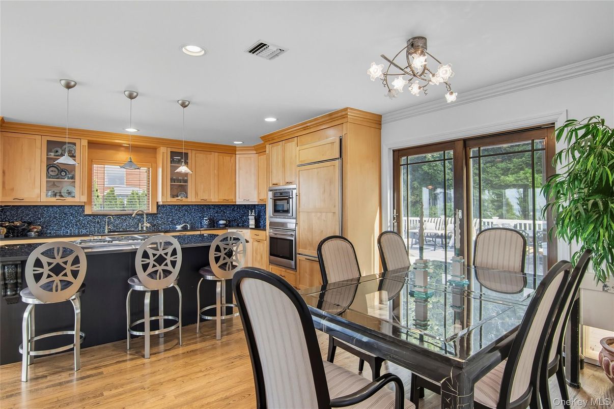 Dining room, Interior, Kitchen, Recessed Lighting, Stainless Steel Appliances, Wood Texture Flooring