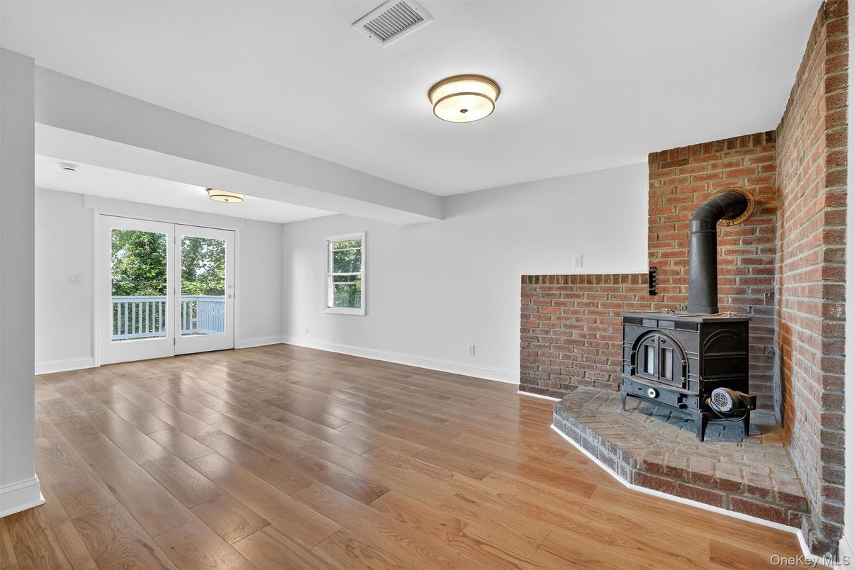 Empty room, Fireplace, Interior, Stone Walls, Wood Texture Flooring