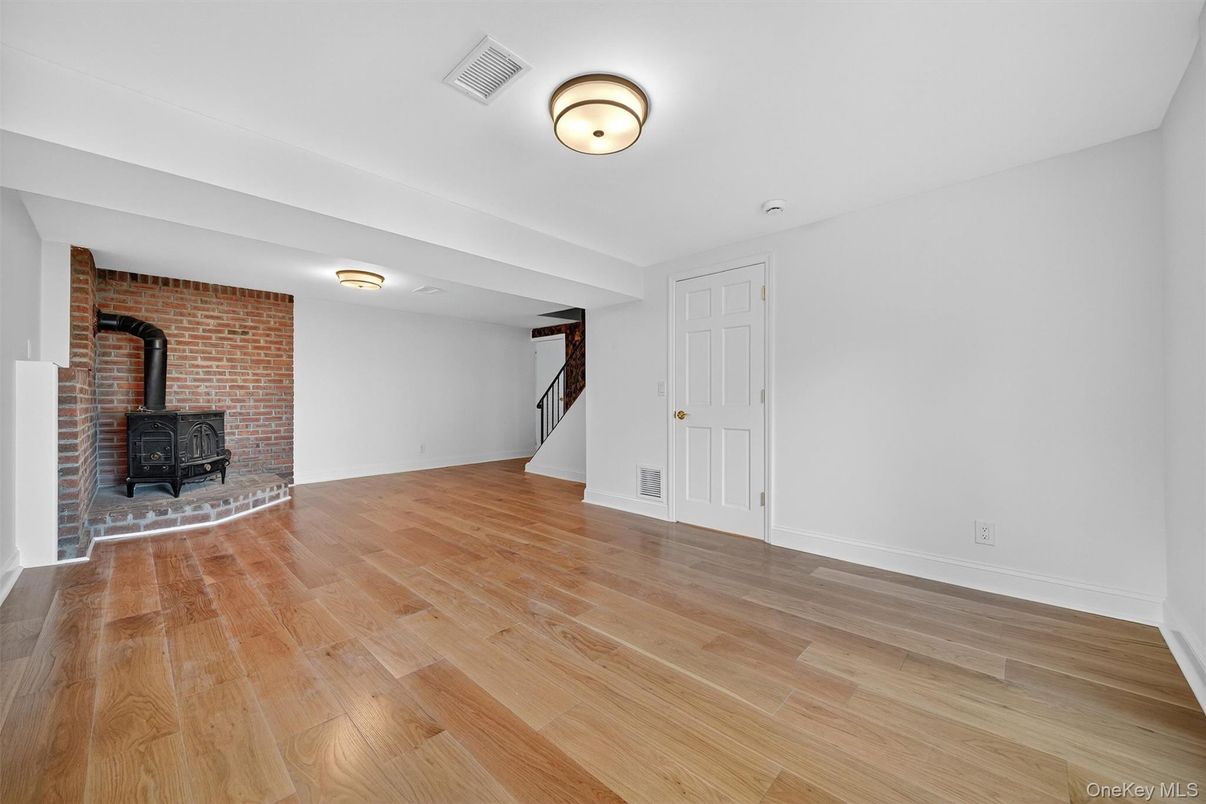 Empty room, Fireplace, Interior, Stone Walls, Wood Texture Flooring