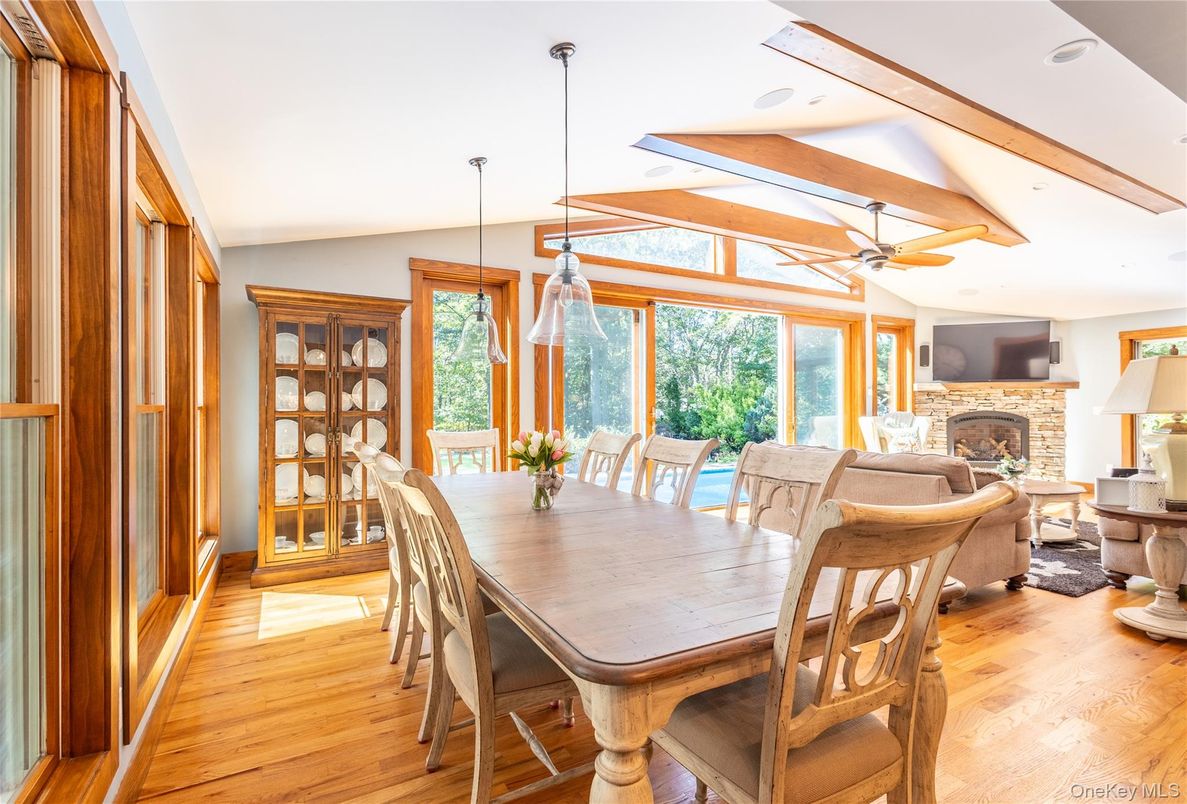 Dining room, Fireplace, Interior, Living room, Pendant Lights, Wooden Beams, Wood Texture Flooring