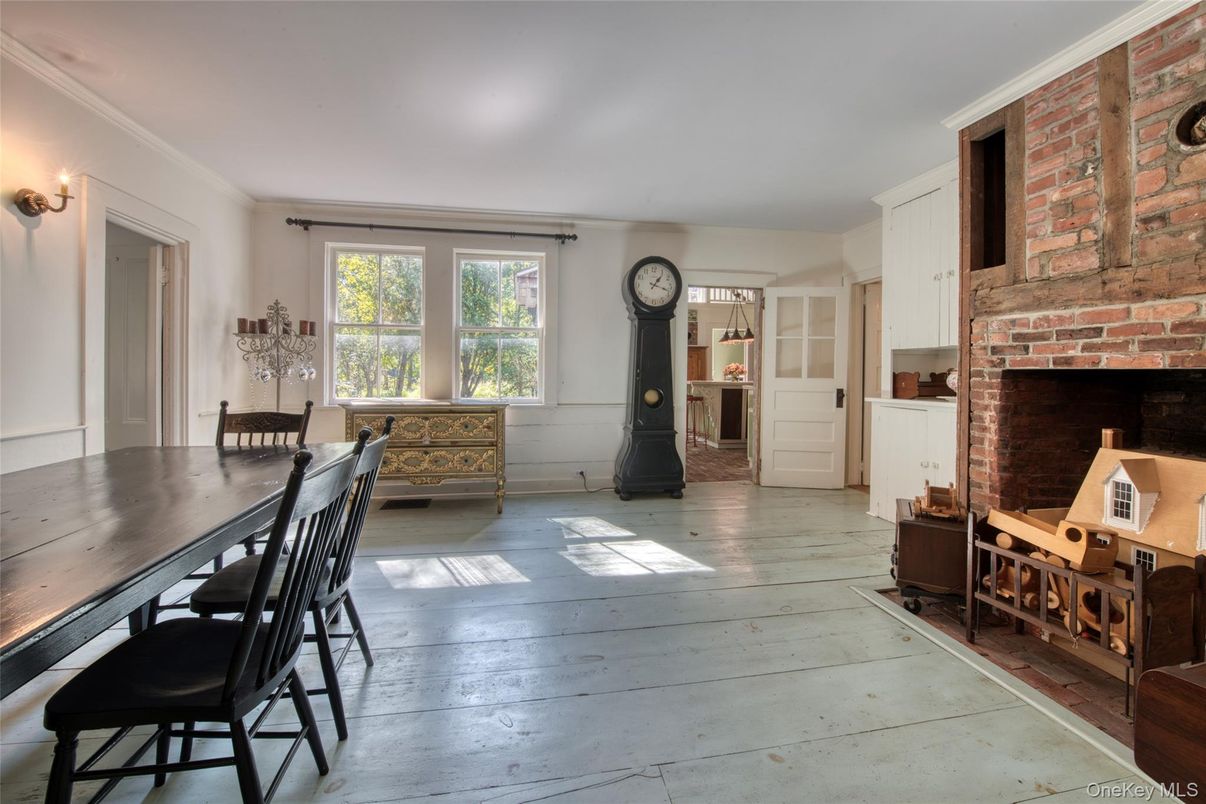 Dining room, Fireplace, Interior, Stone Walls, Wood Texture Flooring