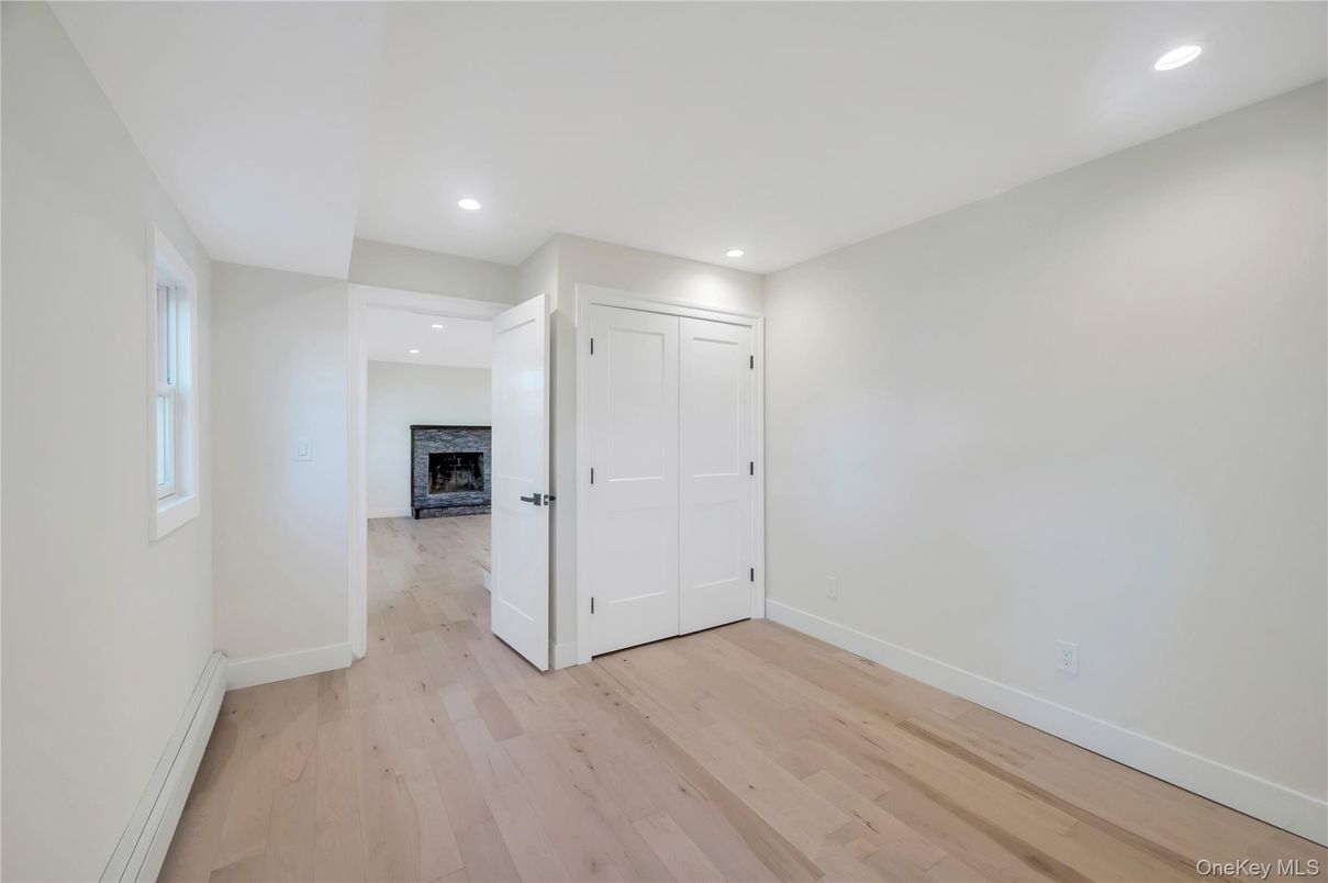 Empty room, Fireplace, Interior, Recessed Lighting, Wood Texture Flooring