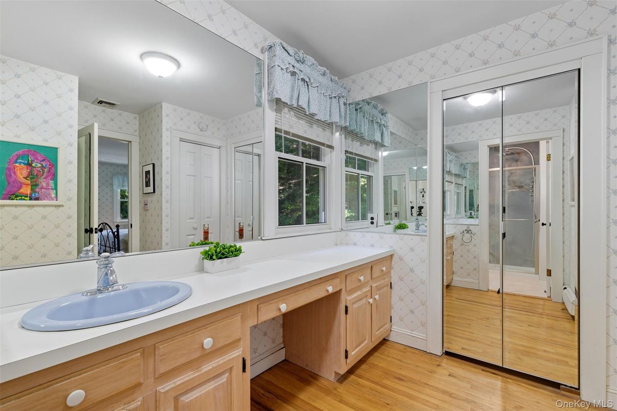 Bathroom, Dual Sink Vanities, Glass Shower, Interior, Wood Texture Flooring