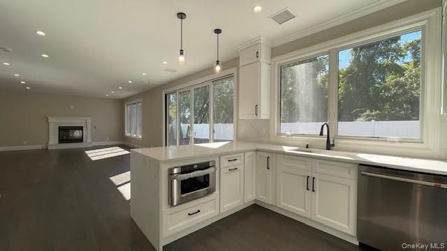Fireplace, Interior, Kitchen, Pendant Lights, Recessed Lighting, Stainless Steel Appliances, Wood Texture Flooring