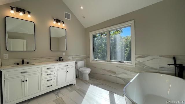 Bathroom, Dual Sink Vanities, Free Standing Baths, Interior, Marble, Marble Walls, Recessed Lighting