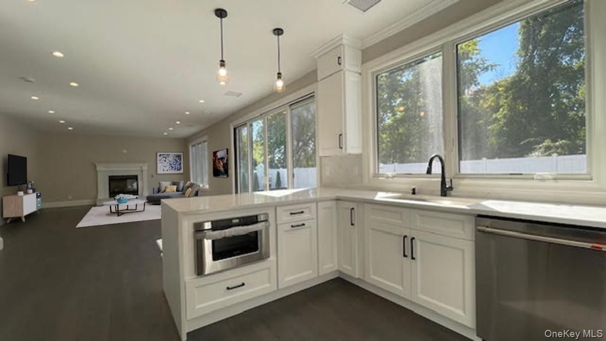 Fireplace, Interior, Kitchen, Living room, Pendant Lights, Recessed Lighting, Stainless Steel Appliances, Wood Texture Flooring