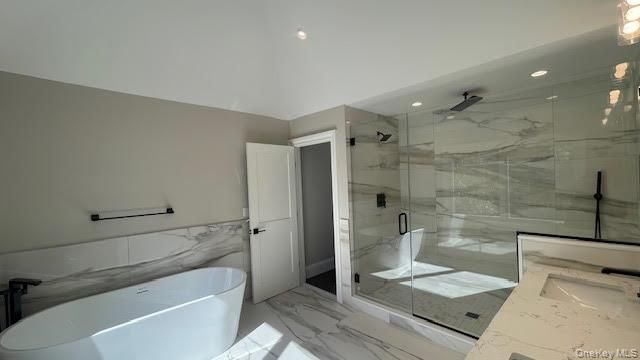 Bathroom, Free Standing Baths, Glass Shower, Interior, Marble, Marble Walls, Recessed Lighting