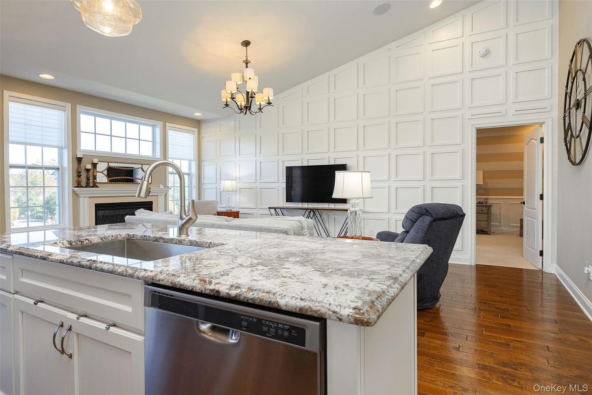 Chandelier, Fireplace, Interior, Kitchen, Recessed Lighting, Wood Texture Flooring