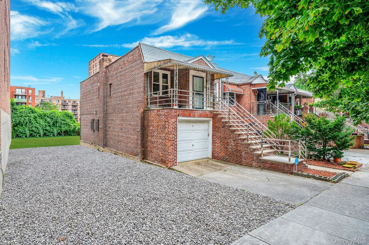 Attached, Exterior, Facade, Brick Facade, Tudor Revival