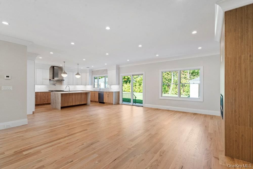 Interior, Kitchen, Marble Walls, Pendant Lights, Recessed Lighting, Stainless Steel Appliances, Wood Texture Flooring