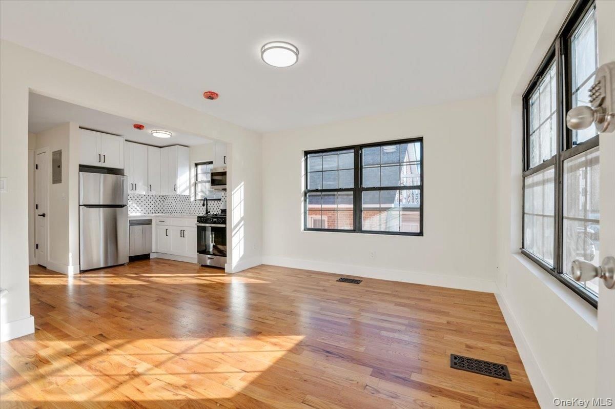 Empty room, Interior, Kitchen, Stainless Steel Appliances, Wood Texture Flooring