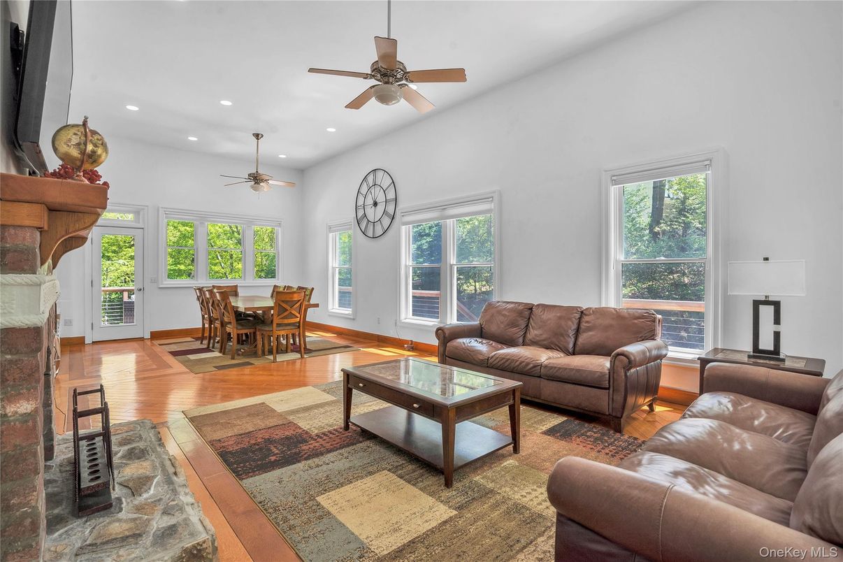 Dining room, Fireplace, Interior, Living room, Recessed Lighting, Wood Texture Flooring