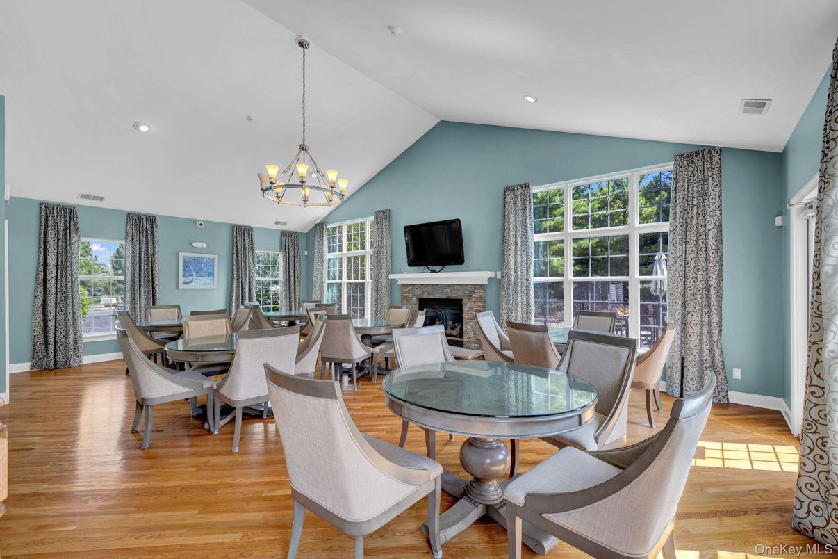 Chandelier, Dining room, Fireplace, Interior, Living room, Recessed Lighting, Wood Texture Flooring