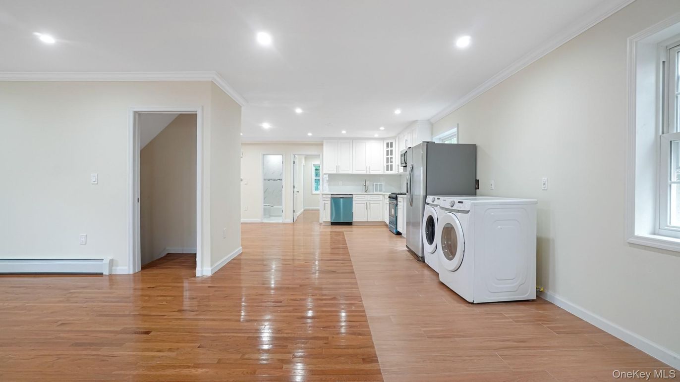 Interior, Kitchen, Recessed Lighting, Washer, Wood Texture Flooring
