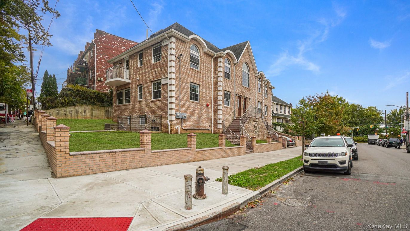 Exterior, Facade, Brick Facade, Condo Building