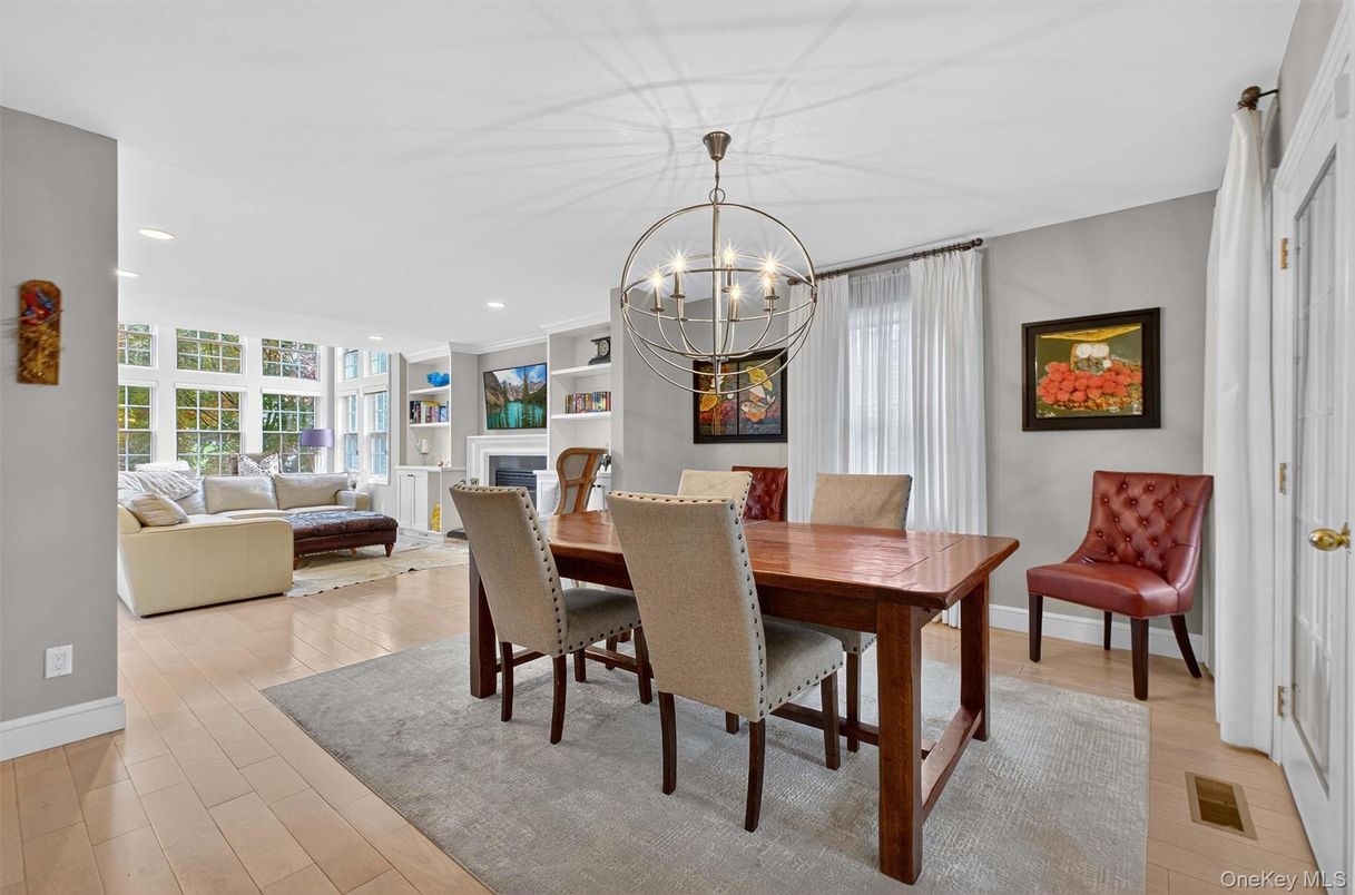Chandelier, Dining room, Fireplace, Interior, Living room, Recessed Lighting, Wood Texture Flooring
