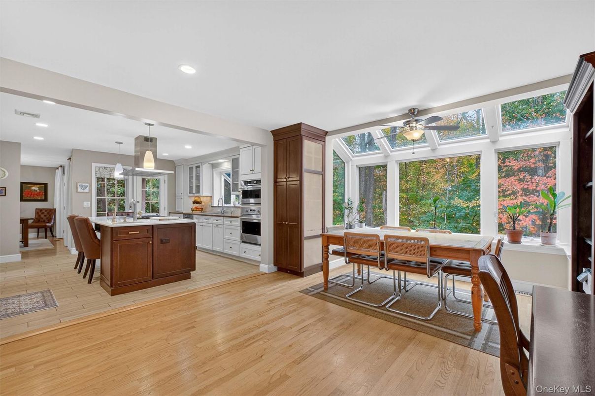 Dining room, Interior, Kitchen, Pendant Lights, Recessed Lighting, Stainless Steel Appliances, Wood Texture Flooring