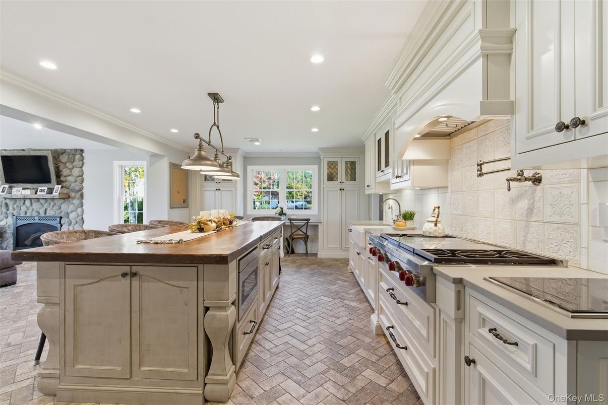 Interior, Kitchen, Pendant Lights, Recessed Lighting, Stainless Steel Appliances, Stone Walls