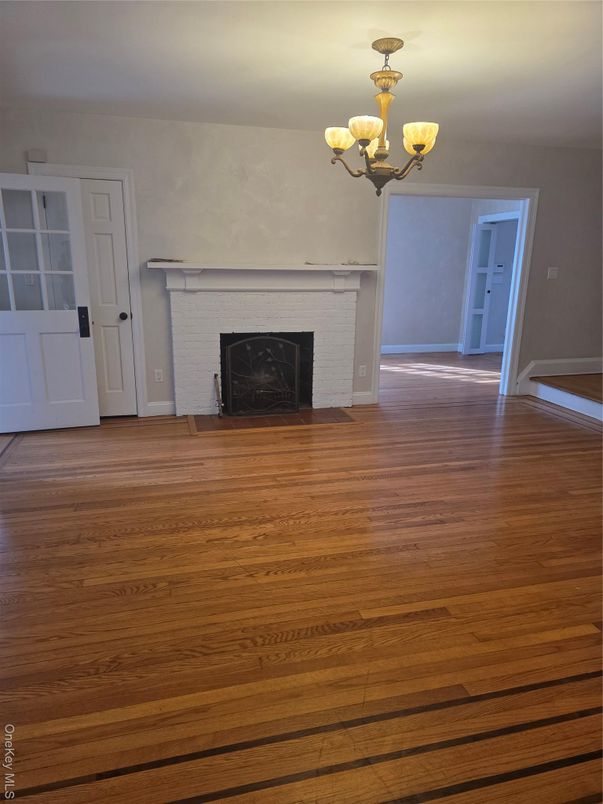 Chandelier, Empty room, Fireplace, Interior, Wood Texture Flooring