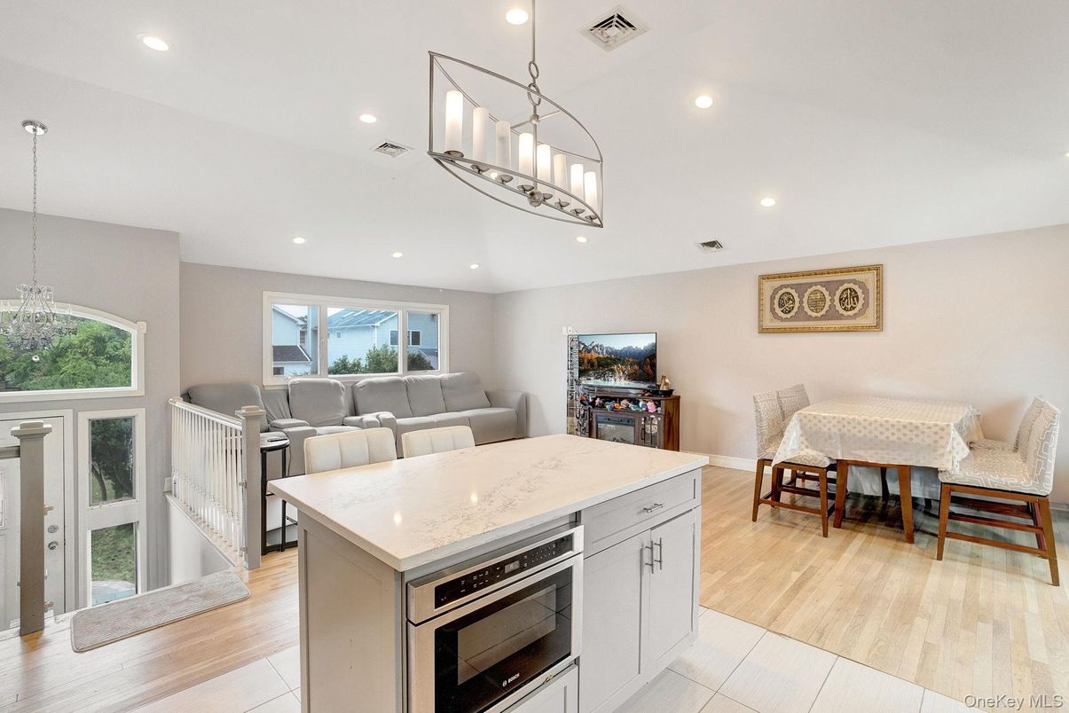 Chandelier, Dining room, Interior, Kitchen, Living room, Pendant Lights, Recessed Lighting, Wood Texture Flooring