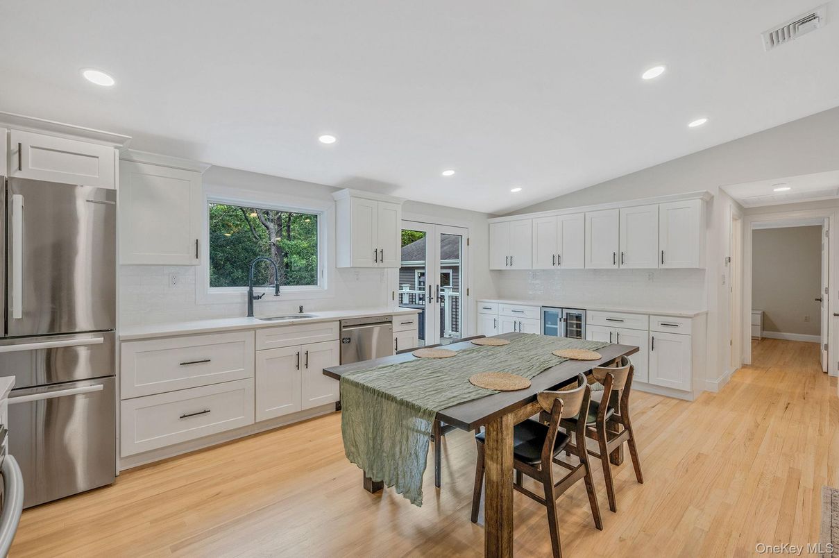 Dining room, Interior, Kitchen, Recessed Lighting, Stainless Steel Appliances, Wood Texture Flooring