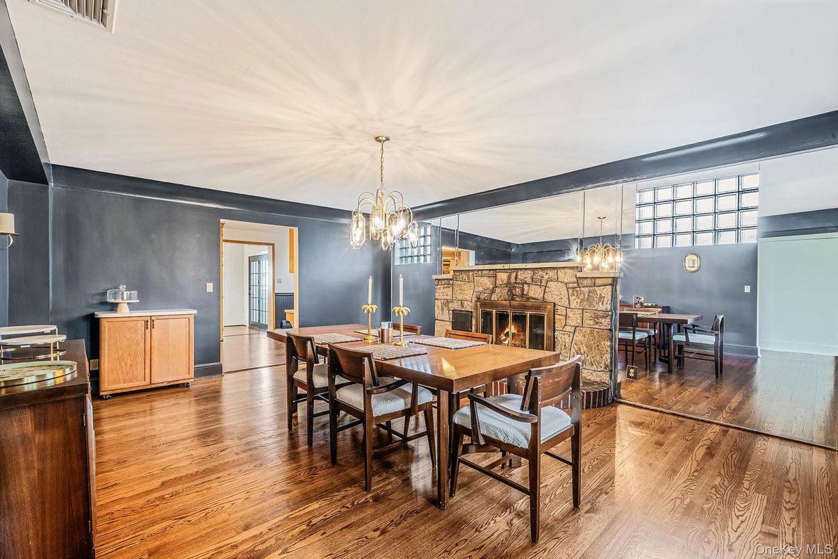 Chandelier, Dining room, Fireplace, Interior, Wood Texture Flooring